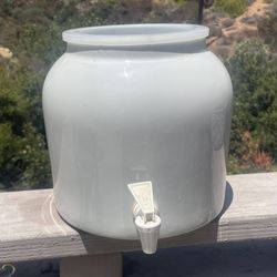 white porcelain water dispenser crock
