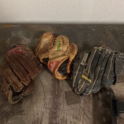 Very Worn Baseball Gloves