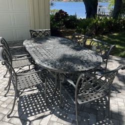 Cast Aluminum Table And Chairs