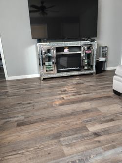 Beautiful Fireplace and 75 Inch Samsung Smart TV