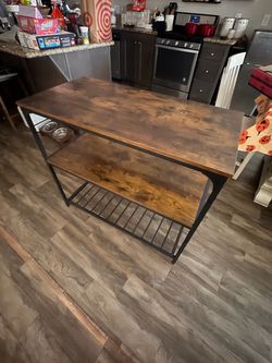 Kitchen island with storage shelves
