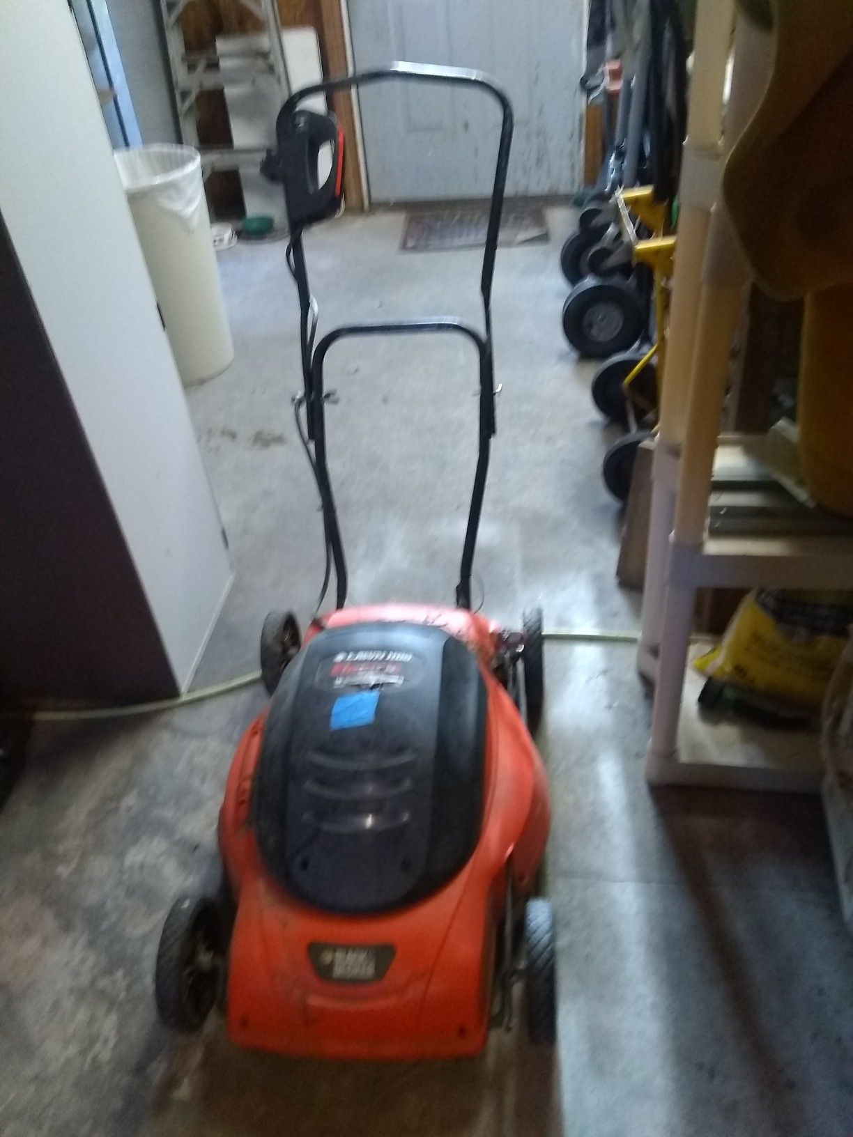 Electric lawn mower. 18"