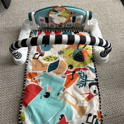 activity play mat with piano