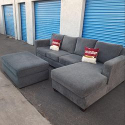 Beautiful sectional couch gray with ottoman, very nice