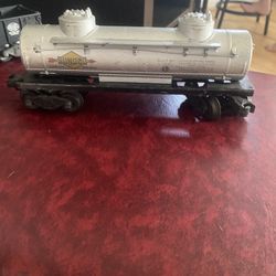 vintage Lionel O gauge Sunoco double-dome tanker car, specifically model number 6465