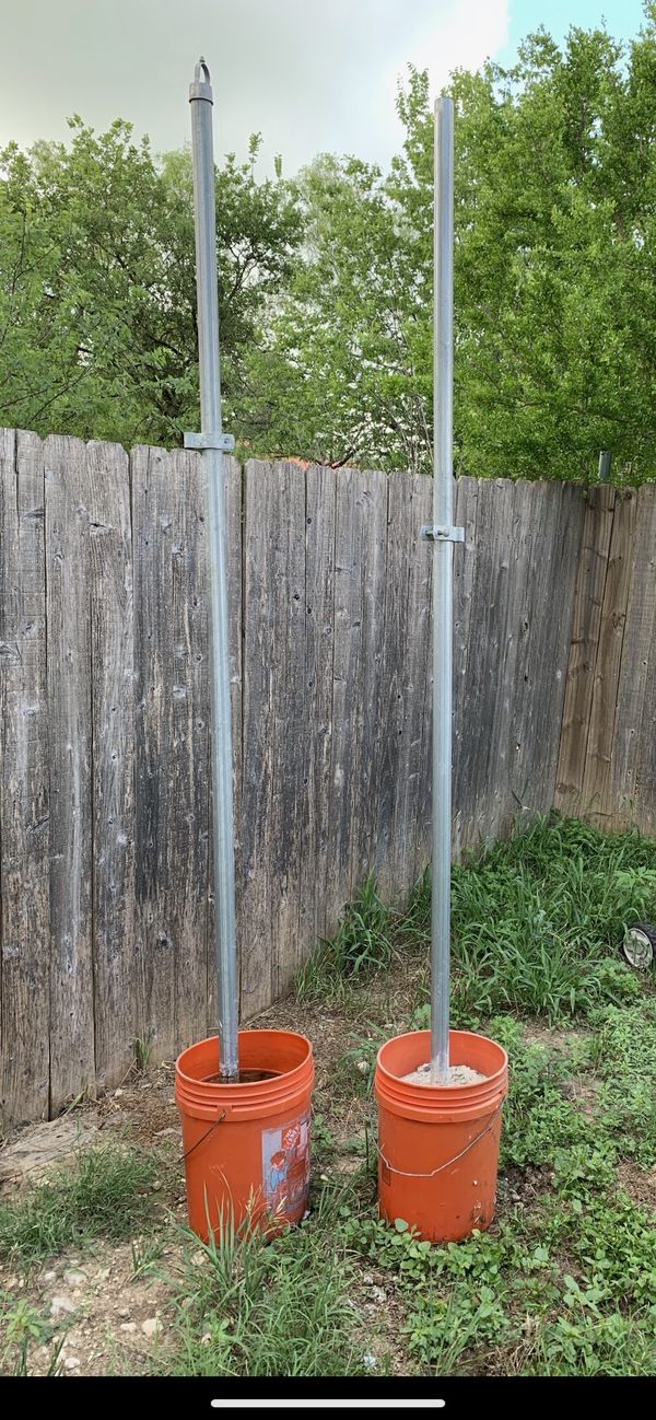 FREE Posts inside bucket of concrete for Sale in San Antonio, TX OfferUp
