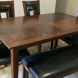 Table 4 Chairs And A Bench