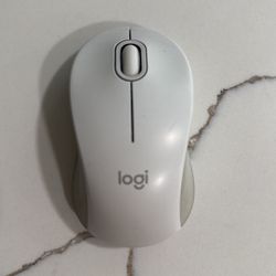 Logi Tech Wireless Mouse.