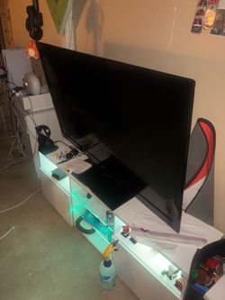 Tv and LED light white tv stand