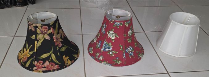 Title: 3 Vintage Fabric Bell Lamp Shades
Three fabric bell lamp shades.
2 floral bell shades: 14" bottom diameter, 9" height, brass fitter, great cond