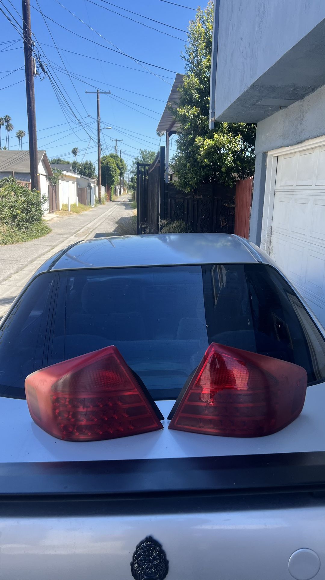 infiniti g35 03 - 04 tail lights and infiniti g35 rear bumper