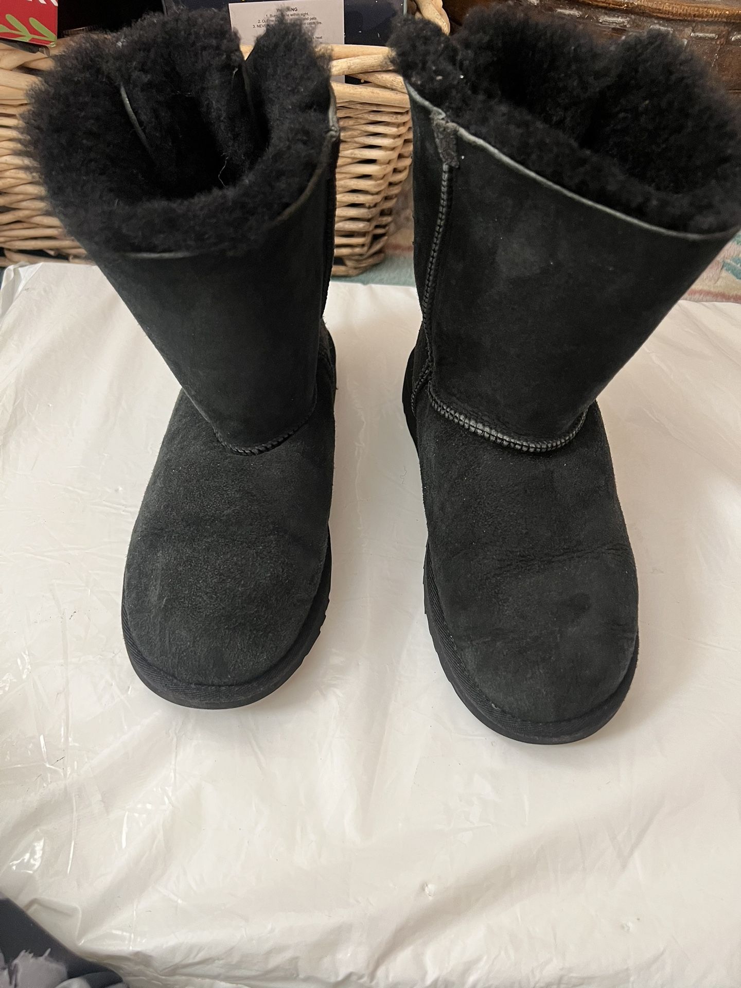 UGG Cozy black boots with plush lining. Ideal for cold weather. Used in good condition. Size 4. See pictures