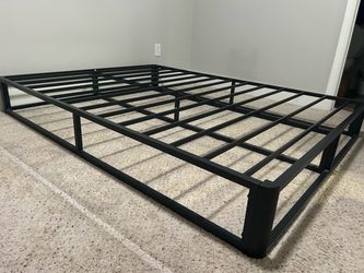 Black metal queen bed frame