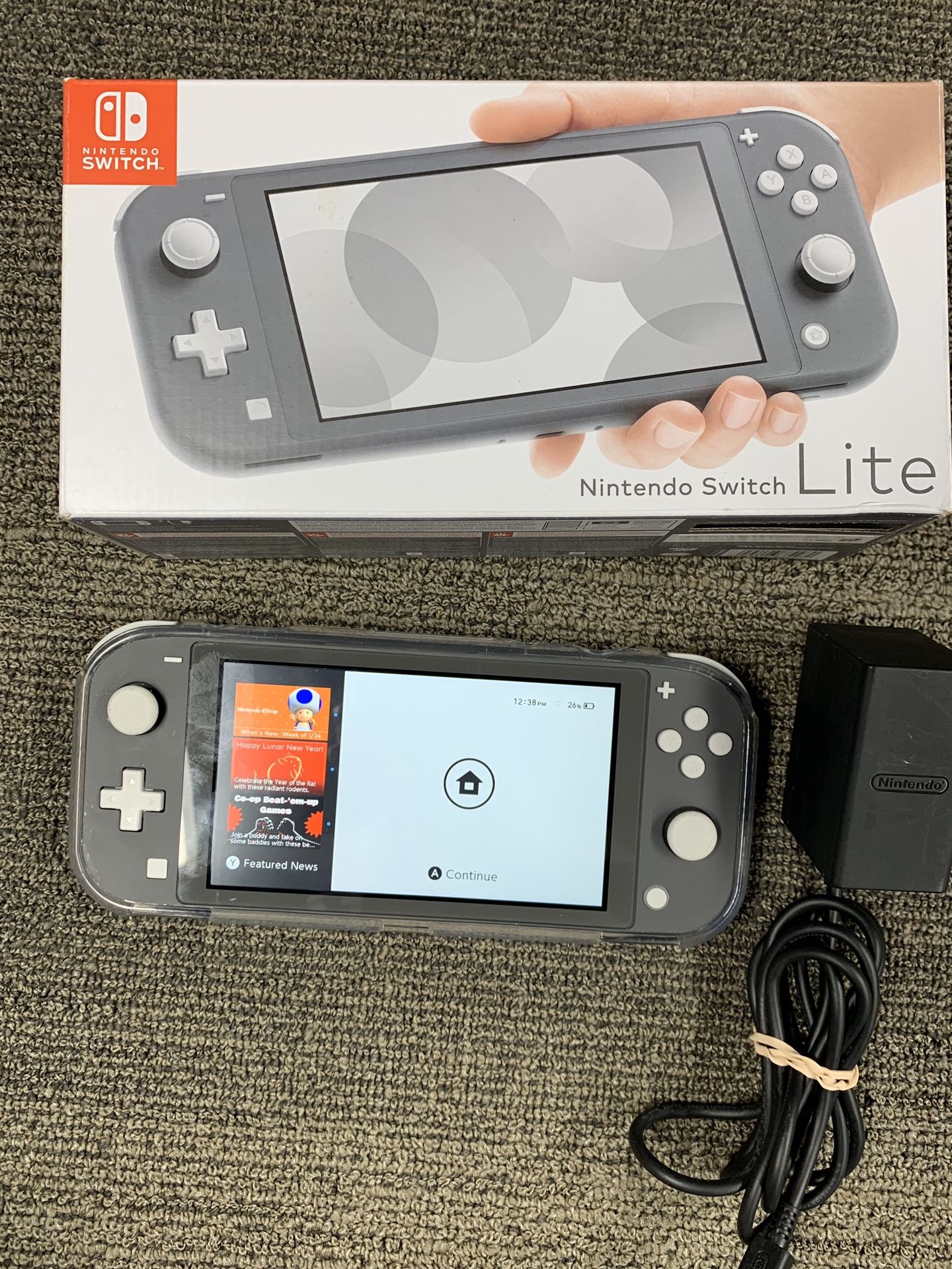 Gray Nintendo Switch Lite with All accessories & Clear Protective Case.