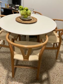 CB2 Round White Dining Table with 4 Wishbone Chairs