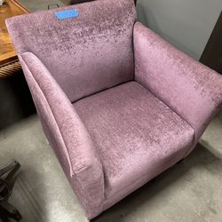 single armchair in mauve or dusty rose. 