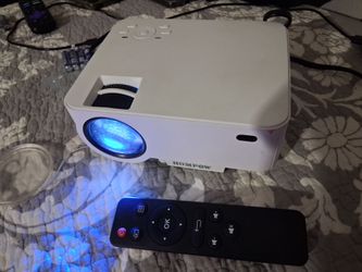 MINI HOMPOW 1080P PROJECTOR  $25.00