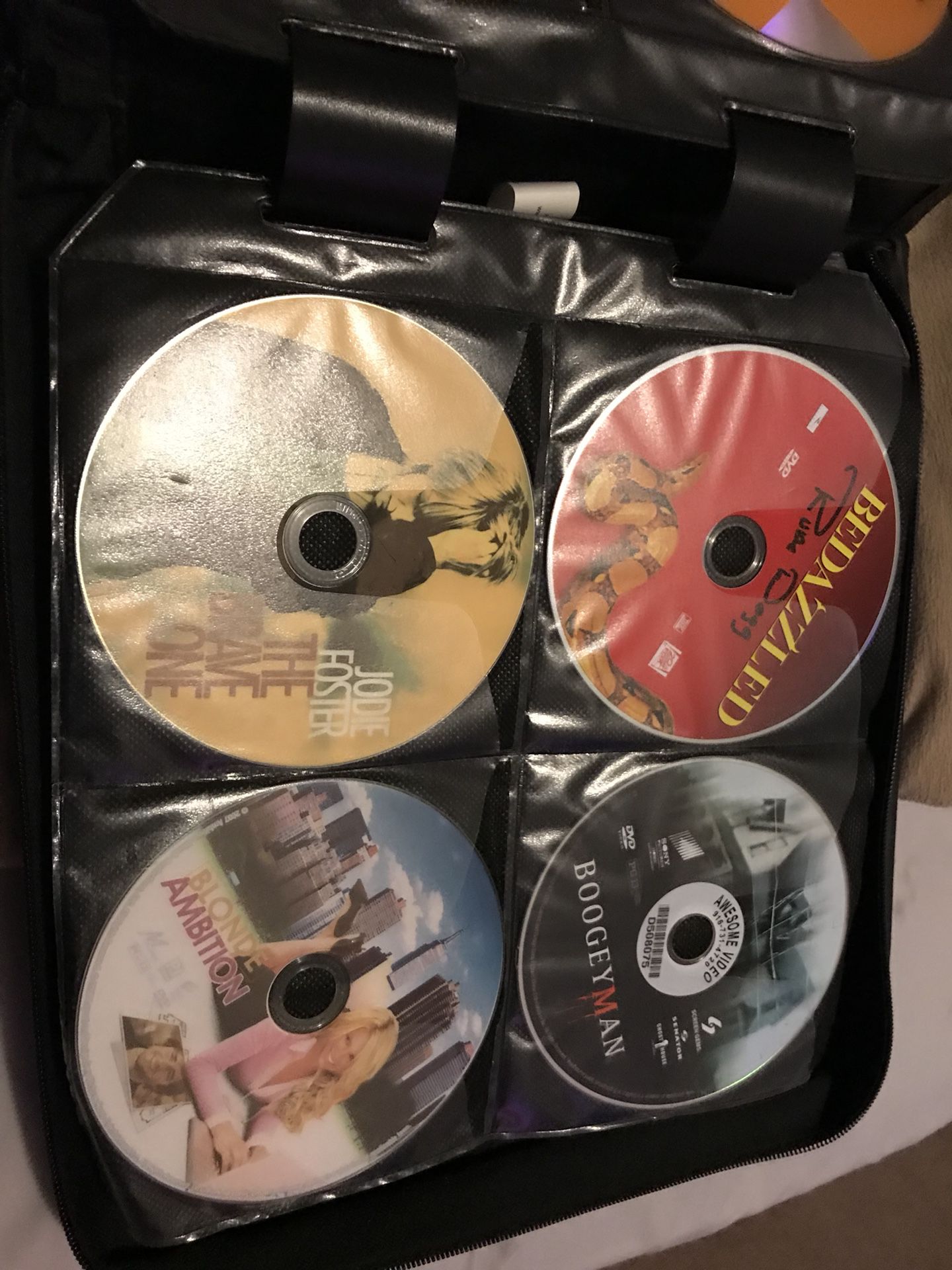 Assortment of DVDs no cases