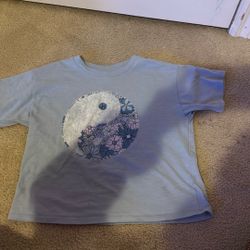 Blue Shirt With A Yin Yang On It 
