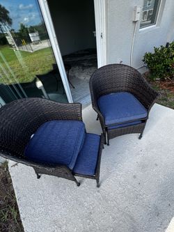 Patio Chairs with Blue Cushions and Foot Stools