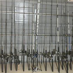 LOTS of fishing poles and reels