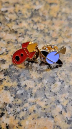 2-Piece Space Enamel Pin Lot - Retro Rocketship & Ringed Planet Badge Set