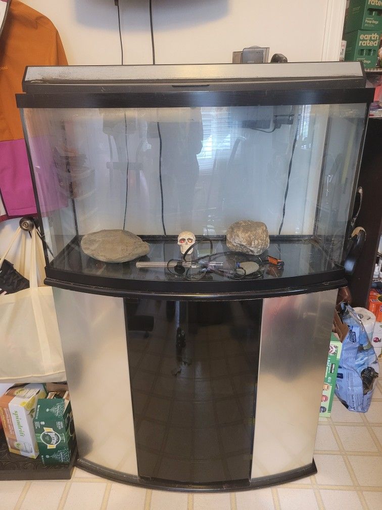 50 Gallon curved aquarium, stand , hood, heater and filter.
