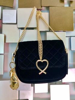 H& M Brand New ! adorable black velvet crossbody bag with gold chain strap and gold heart Very spacious! Is a textured velvet Coming with a nice go