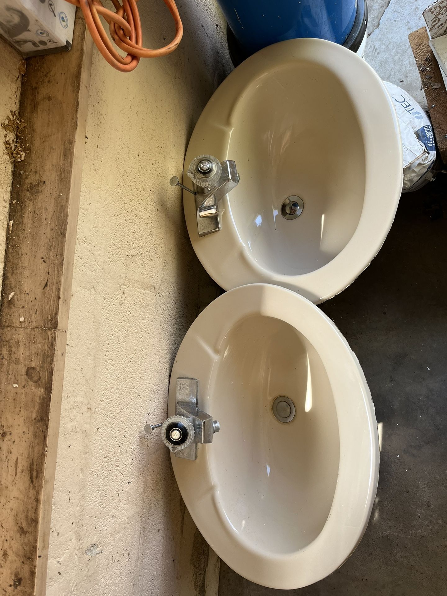 Two Bathroom Sinks With Faucets