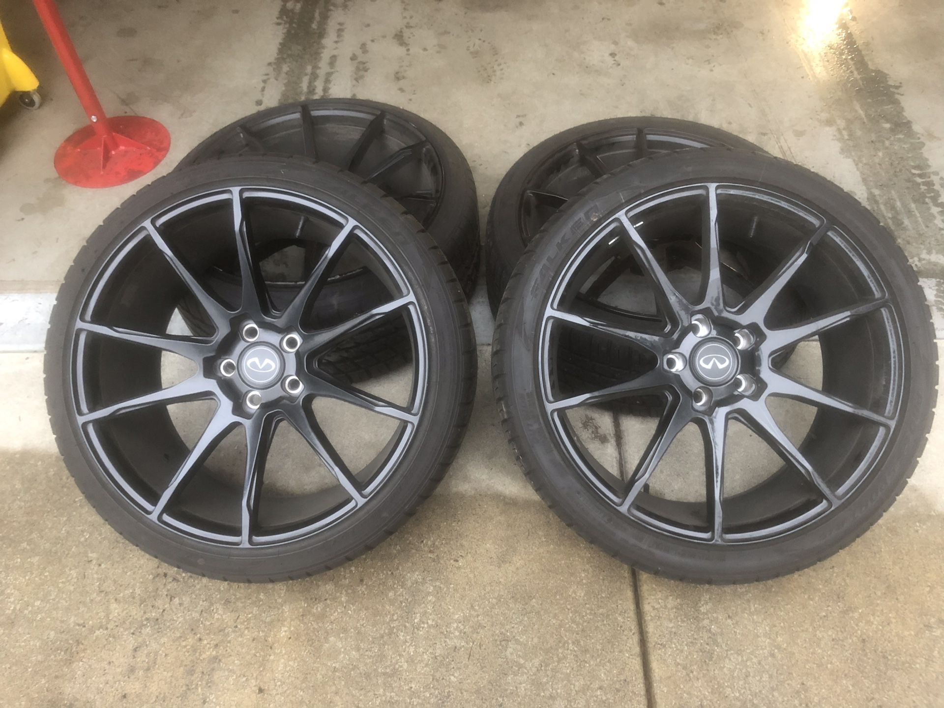 20” black rims and tires