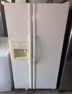 White Whirlpool Refrigerator And Freezer