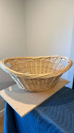 Light brown basket with handles