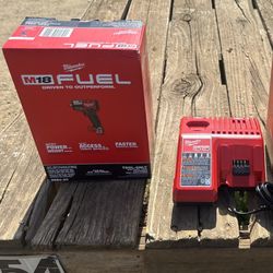 Milwaukee Impact Wrench And Charger 