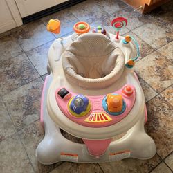 Storkcraft 3-in-1 Activity Walker and Rocker with Jumping Board and Feeding Tray - Pink