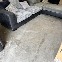 Black And Gray Sectional And Swivel Chair