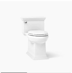 One-piece compact elongated toilet with skirted trapway, 1.28 gpf