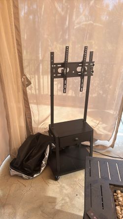 Outdoor patio tv stand and cover.