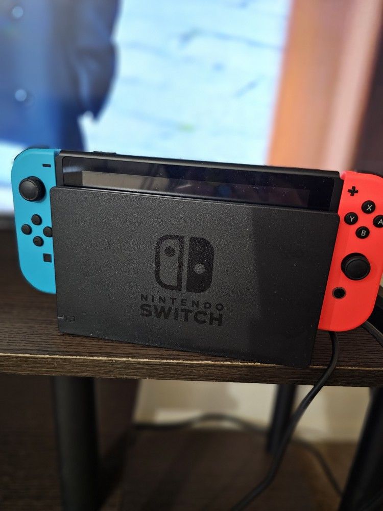 Nintendo Switch with Neon Blue and Neon Red Joy Con Bundle