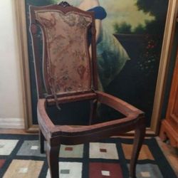 Antique Chair With Two Front Wheels 