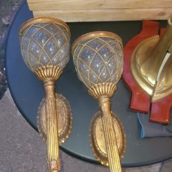 Two Gilded  resin wall sconces 