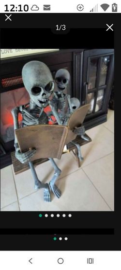 Metal outdoor/indoor Halloween decor - skeleton family reading on a bench   NEW WITH TAGS! RARE FIND! from Home Goods!