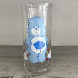 Vintage 1983 Care Bear “Grumpy Bear” Pizza Hut Glass. Holds 16 ounces and is 6” tall.  