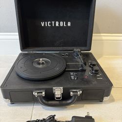 Victrola Suitcase style Record Player With Bluetooth & Built In Speakers 