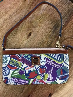 Dooney and Bourke sticker collage wristlet