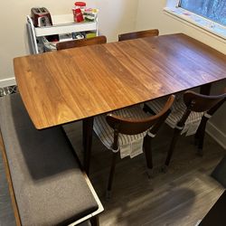 Dining Table With 4 Chars And A Bench. 