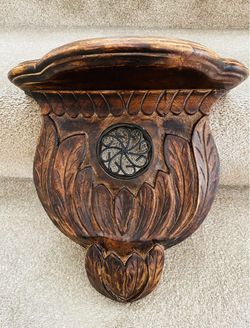Vintage solid wood wall bracket shelf with hand carved leaf design and iron scrollwork