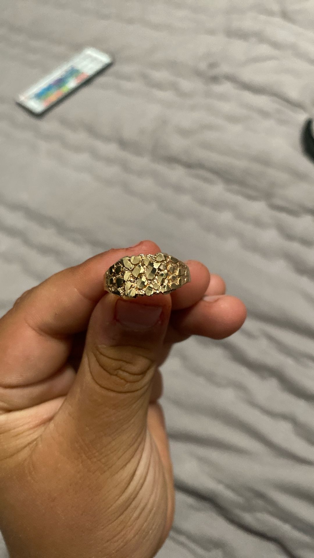 10. Karat Gold Ring.