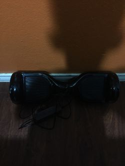 Hoverboard with charger and blue case for it