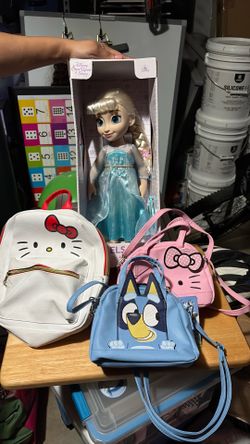 Toy doll, 2 purses, and 1 backpack
