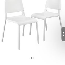 Two white chairs
